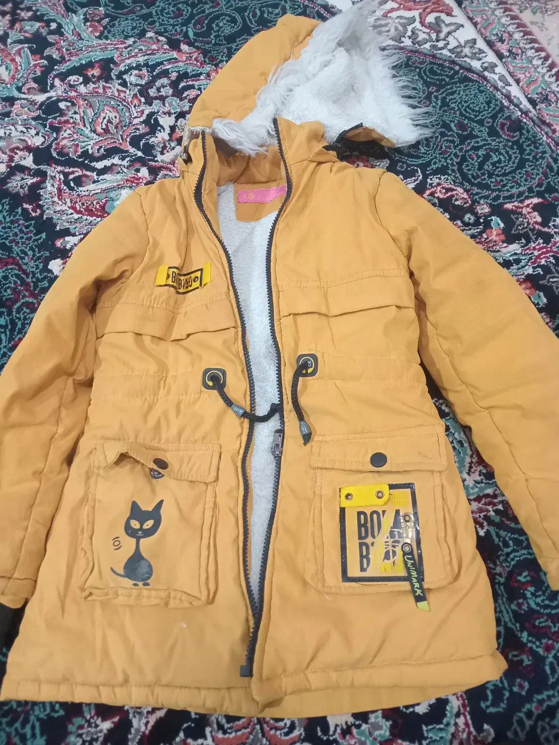 کاپشن|لباس|تربت جام, جامرود|دیوار