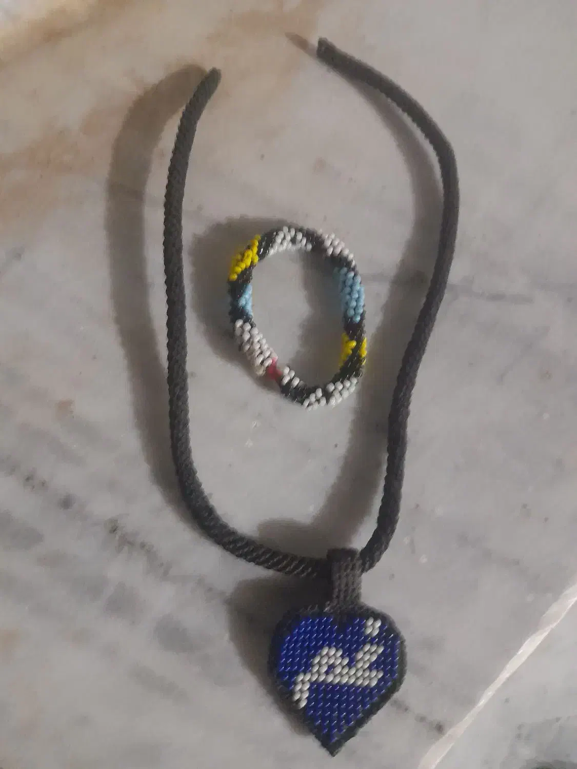 گردنبند و یک دست بند|جواهرات|سراوان, |دیوار