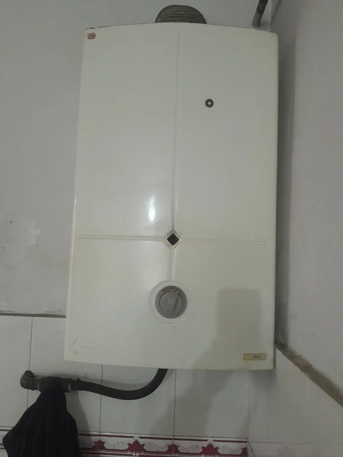 آبگرمکن بوتان|آبگرمکن، پکیج، شوفاژ|سنگر, |دیوار