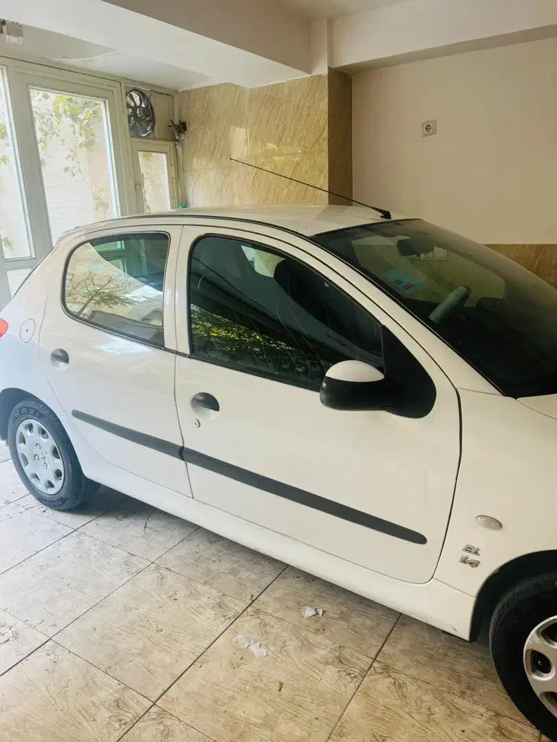 پژو ۲۰۶ تیپ ۲ سفید مدل ۱۳۸۹ بیمه نو|خودرو سواری و وانت|تبریز, |دیوار