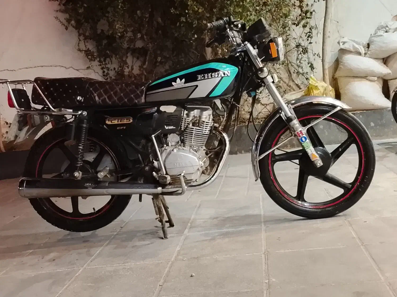 احسان|موتورسیکلت|تربت جام, میان جام|دیوار