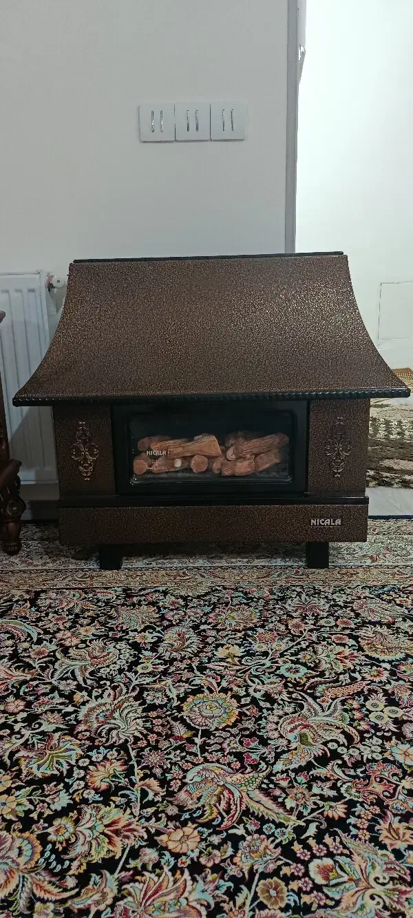 بخاری نیک کالا شومینه در حد نو|بخاری، هیتر، شومینه|اردبیل, |دیوار