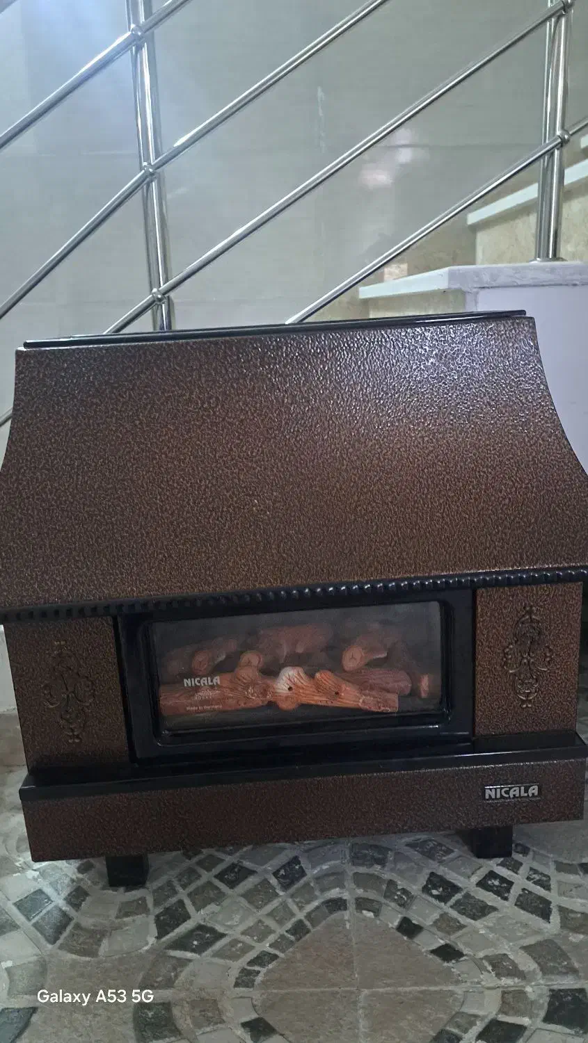 بخاری طرح شومینه در حد نوو|بخاری، هیتر، شومینه|لنگرود, |دیوار