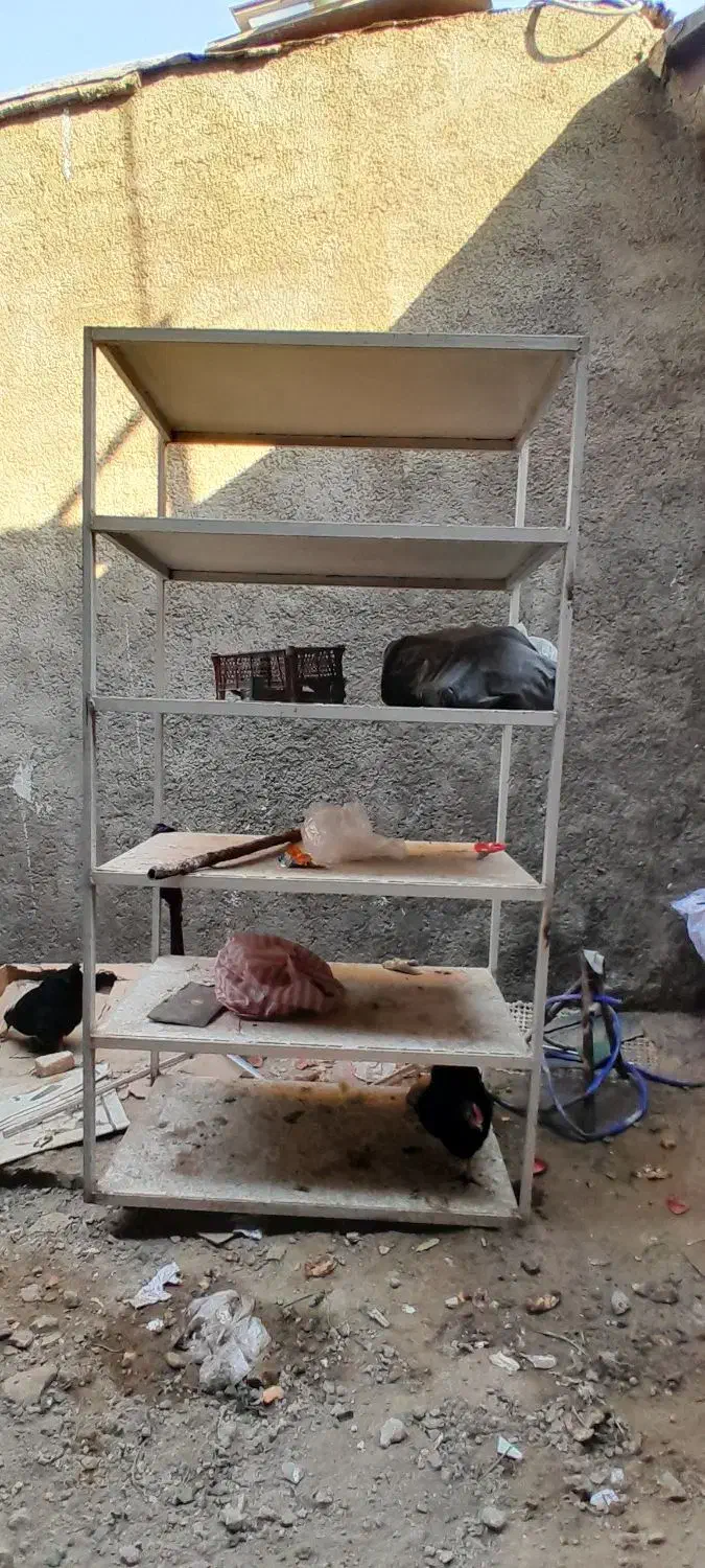 قفسه آهنی با قوطی ابعاد ۶۵×۱۱۰|کتابخانه، شلف، قفسههای دیواری|ری, جوانمرد قصاب|دیوار