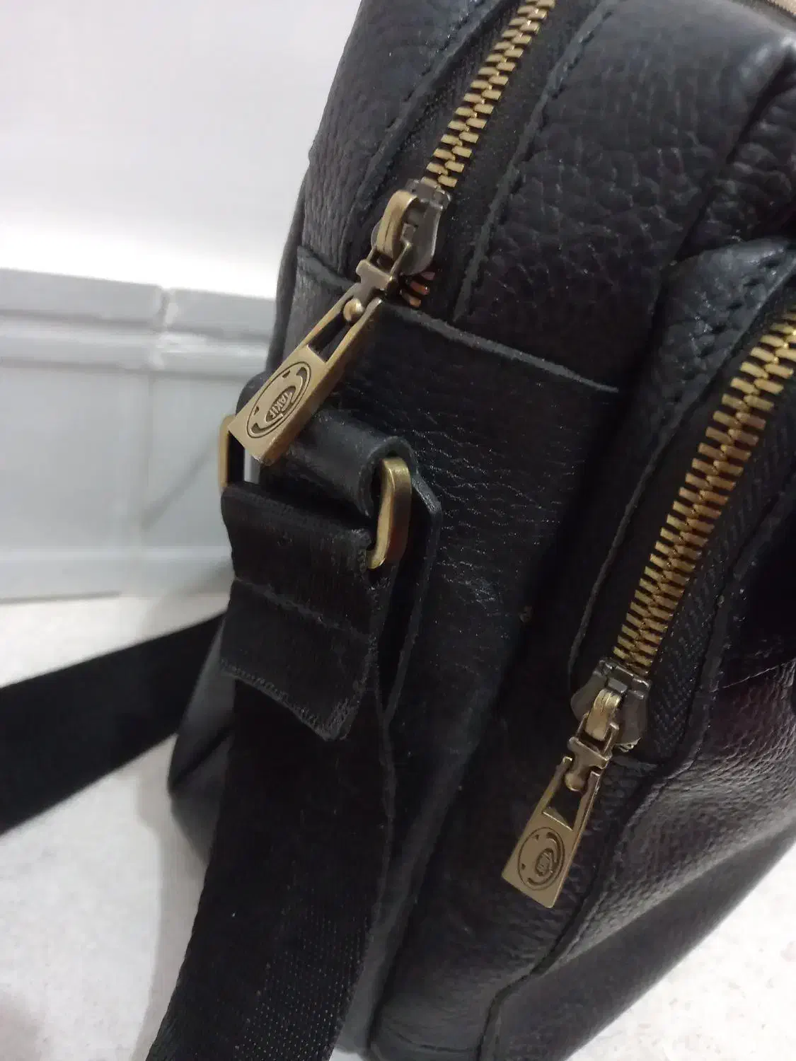 کیف|کیف، کفش، کمربند|نهاوند, |دیوار