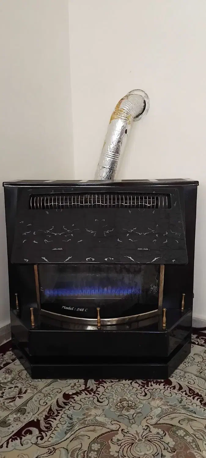 بخاری مدل شومینه ای ظریف|بخاری، هیتر، شومینه|مشهد, صداقیه|دیوار