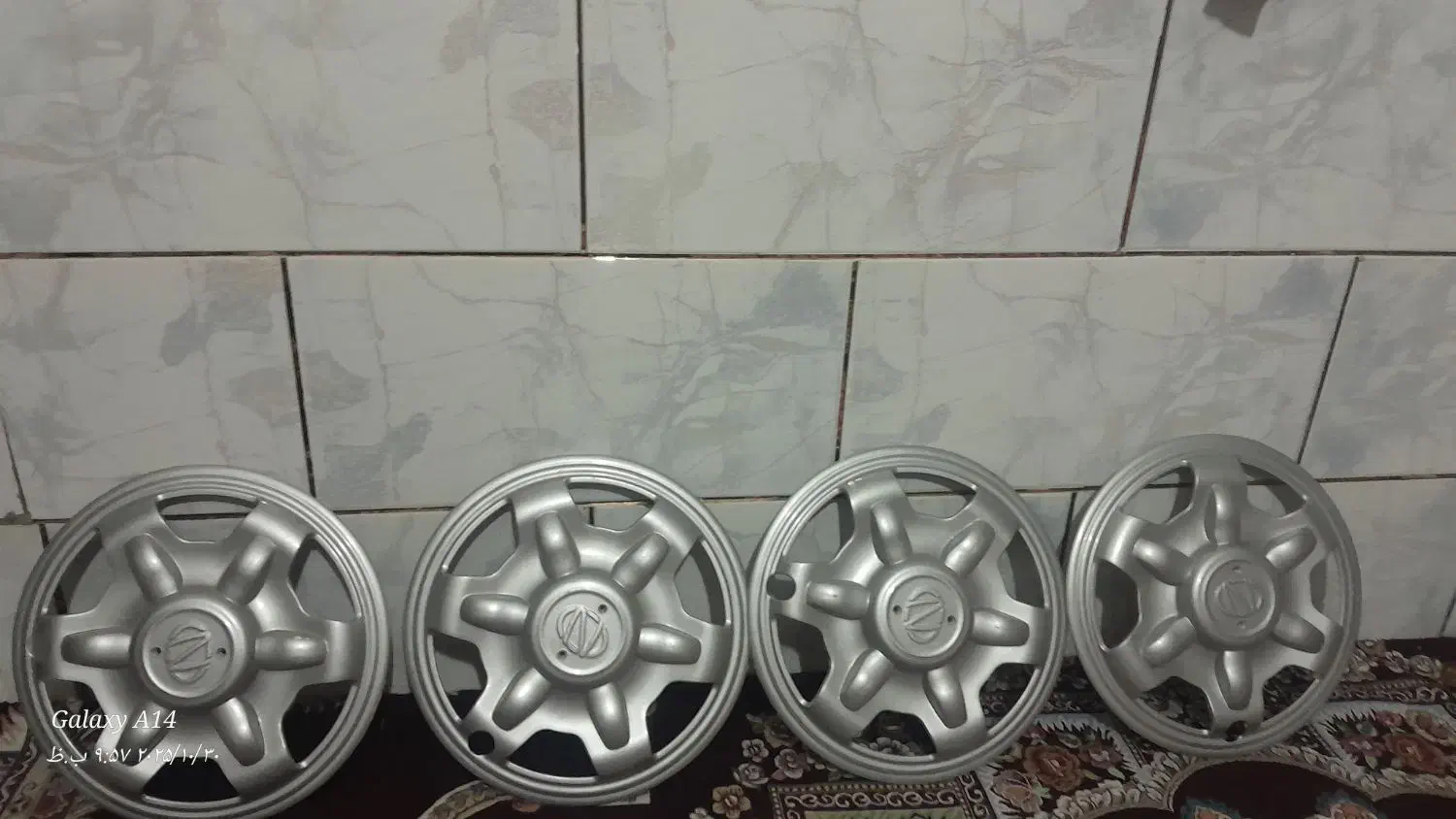 قالپاق نیسان|قطعات یدکی و لوازم جانبی|شیراز, کوشک میدان|دیوار