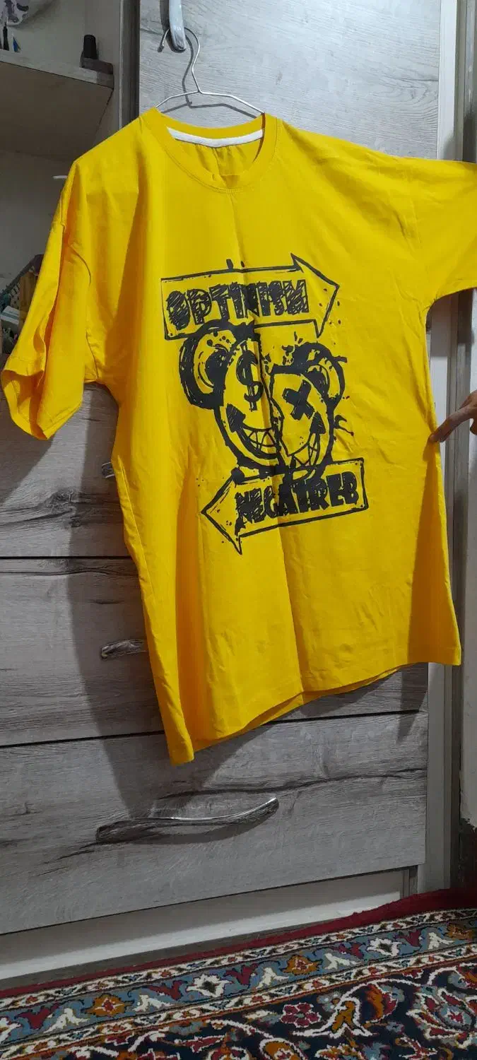 تعدادی لباس نو|لباس|تربت جام, شهید نصرالهی|دیوار