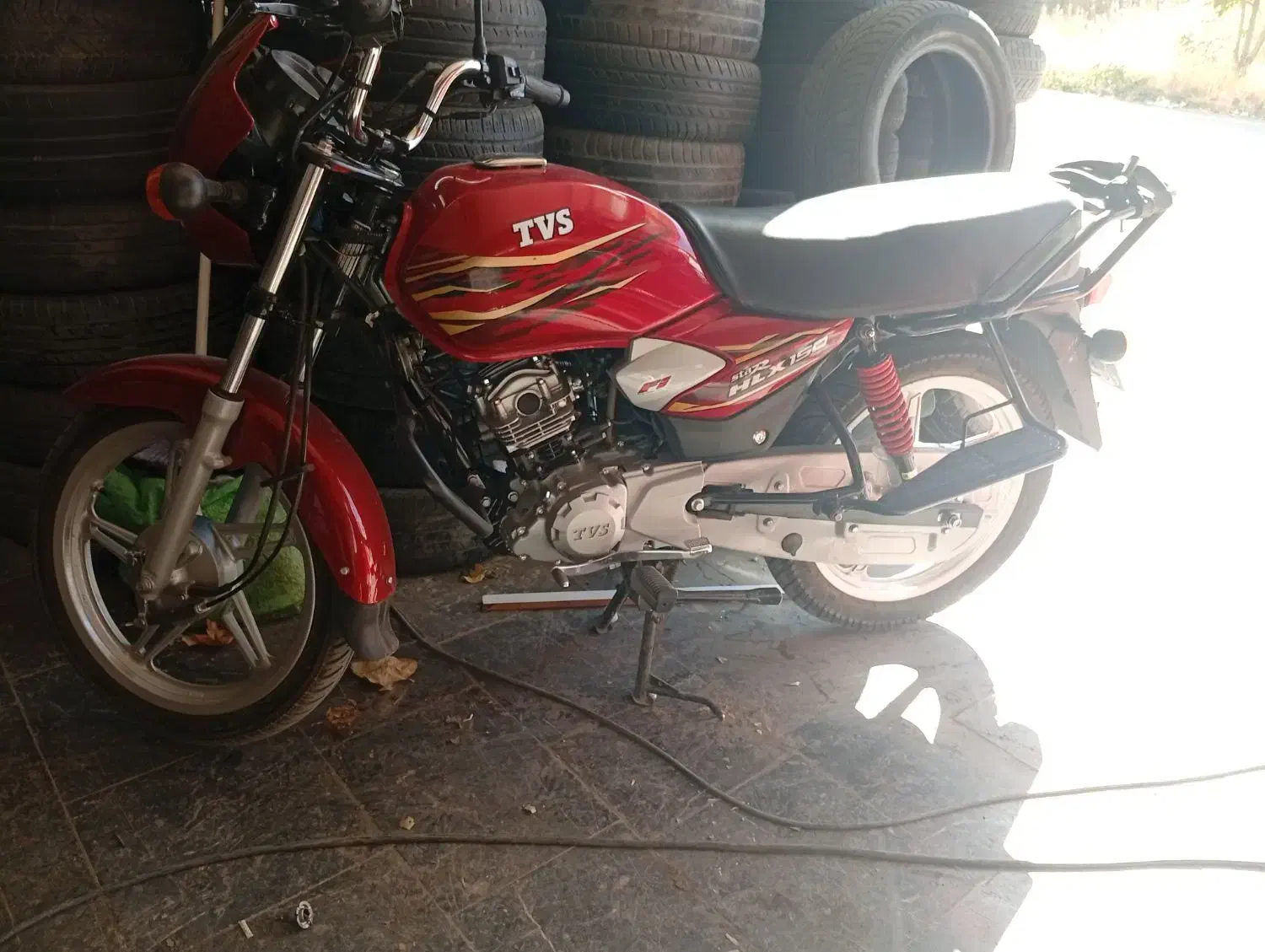 موتور تی وی اس هندی|موتورسیکلت|مریوان, |دیوار