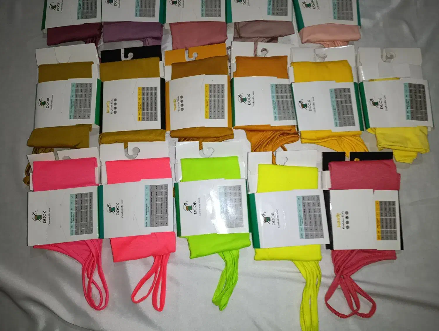 تاپ بندی برند دوک بسته بندی اصلی شرکت|لباس|قزوین, |دیوار