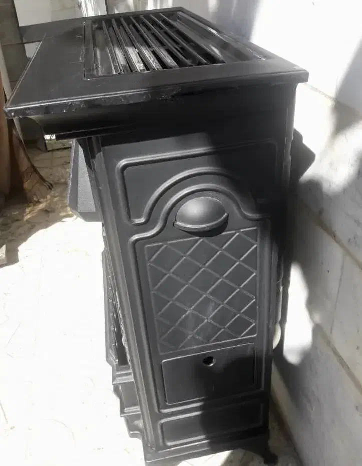 بخاری طرح شومینه تمام چدن نشکن|بخاری، هیتر، شومینه|قوچان, |دیوار