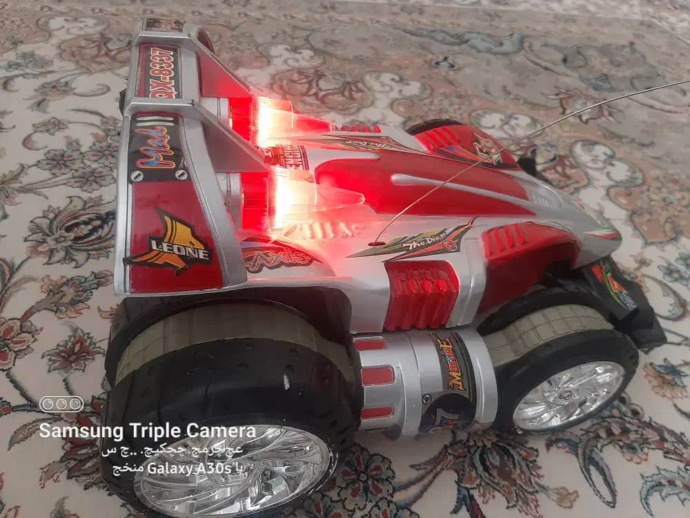 ماشین شارژی۲موتوره کنترل دار آداپتور باطری وغیره|اسباببازی|تهران, تهرانسر غربی|دیوار