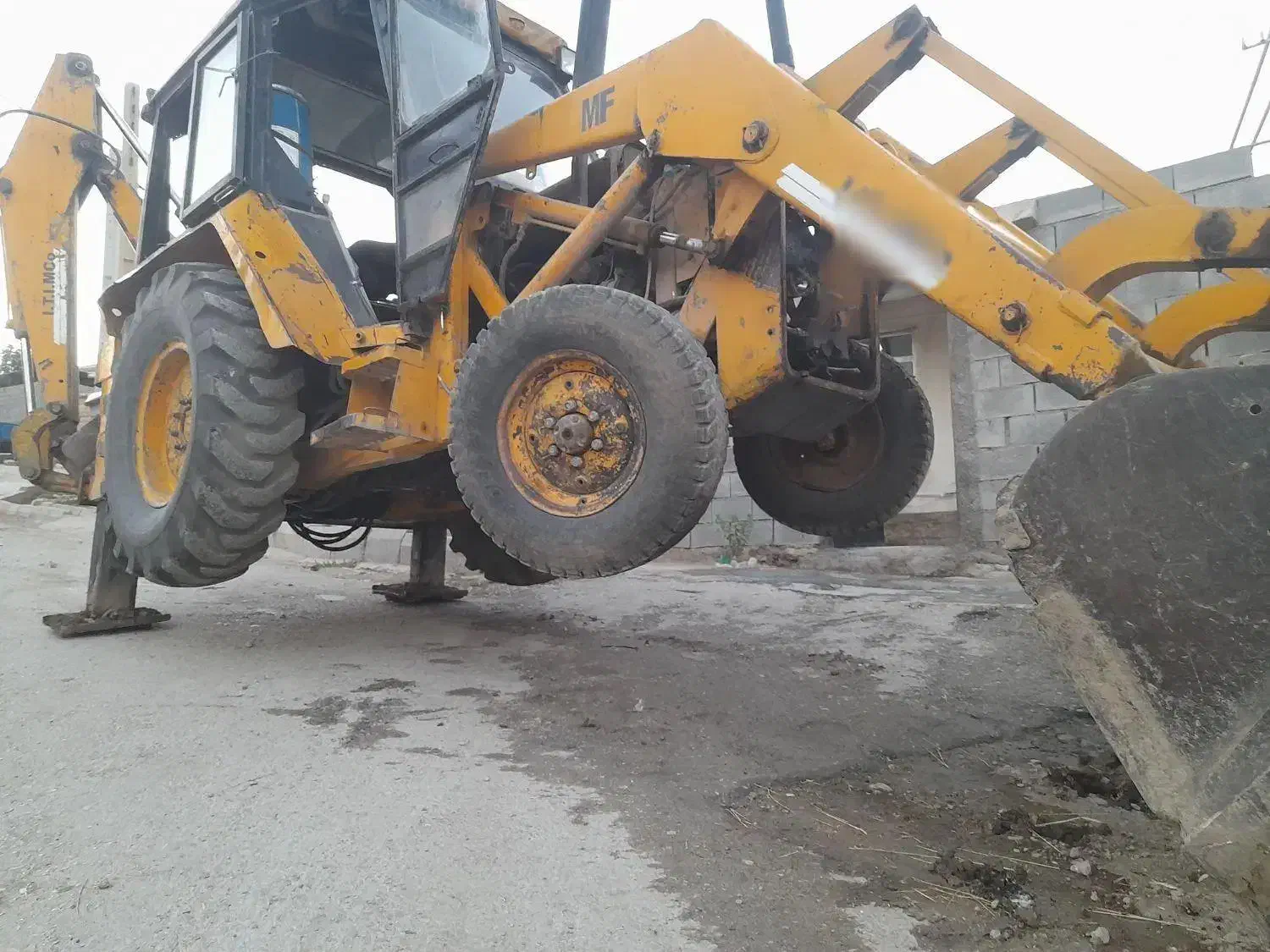 بیل بکهو|خودرو سنگین|گهواره, |دیوار