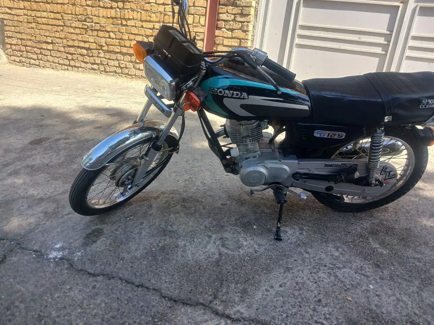 MKZ1393|موتورسیکلت|کنگاور, |دیوار