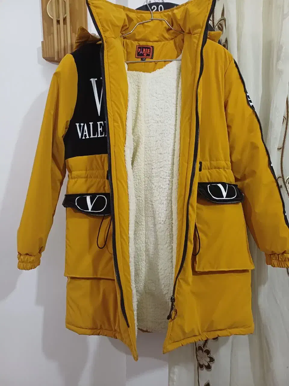 کاپشن|لباس|اراک, |دیوار