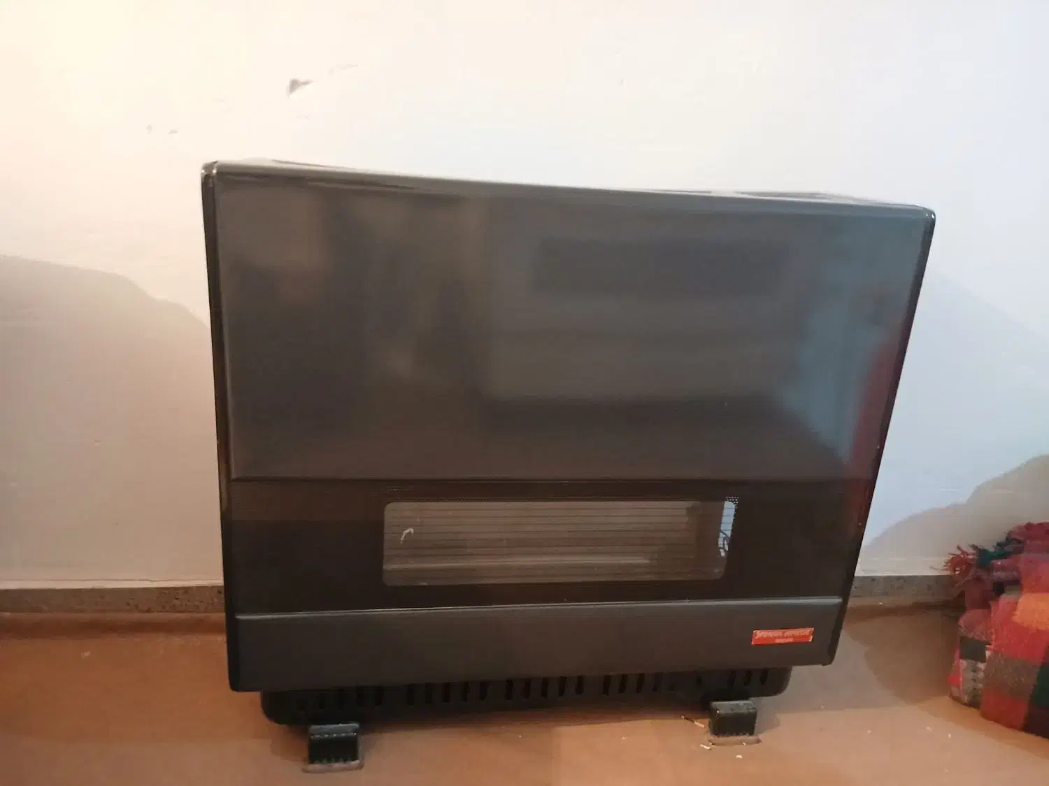 بخاری جهان افروز|بخاری، هیتر، شومینه|بیجار, |دیوار