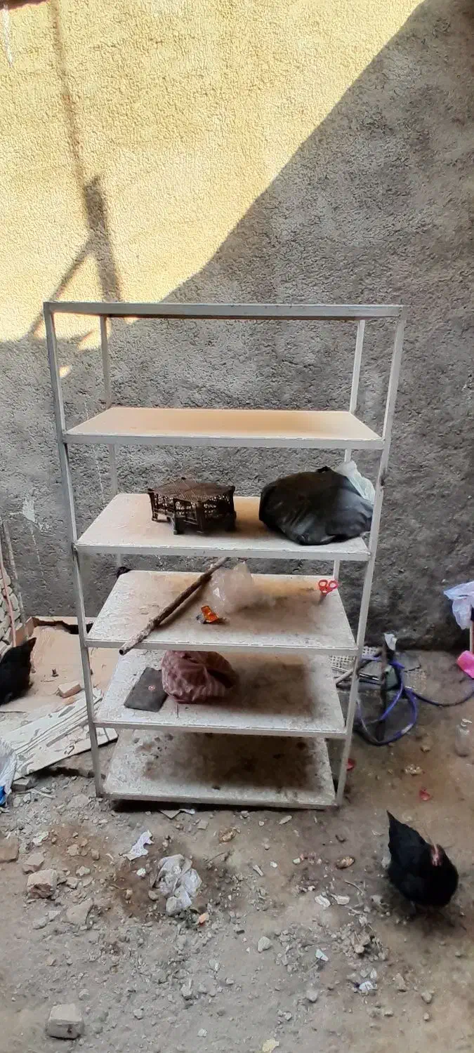 قفسه آهنی با قوطی ابعاد ۶۵×۱۱۰|کتابخانه، شلف، قفسههای دیواری|ری, جوانمرد قصاب|دیوار