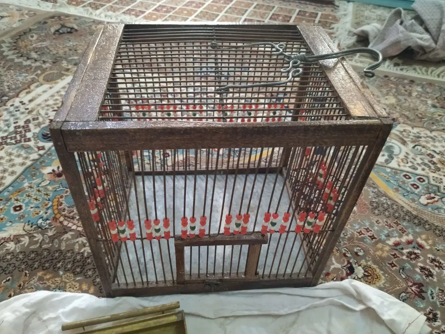 قفس سره چوبی|پرنده|بومهن, |دیوار