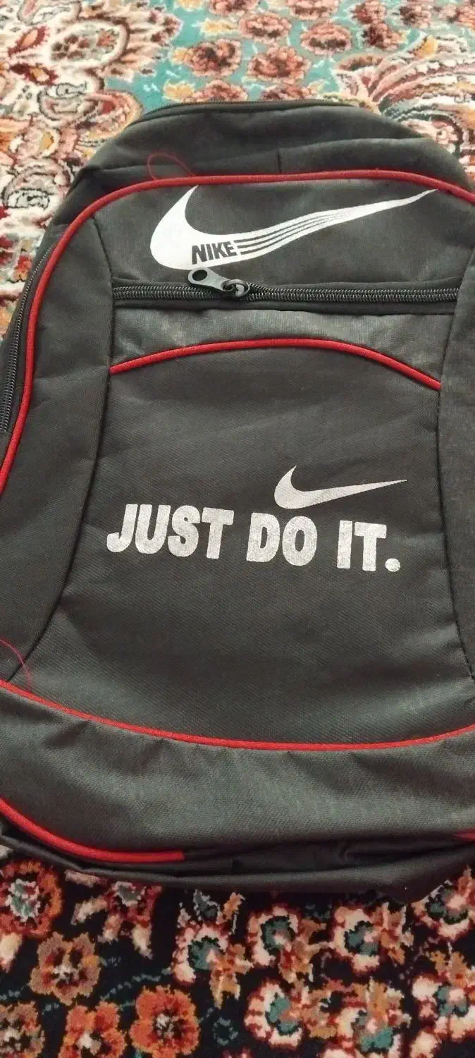 کیف مدرسه|کیف، کفش، کمربند|قم, امامزاده ابراهیم|دیوار