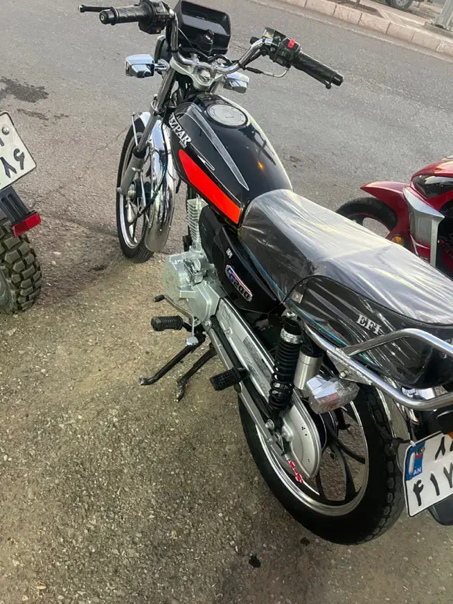 تیزپرتوس ۲۰۰|موتورسیکلت|قائن, |دیوار