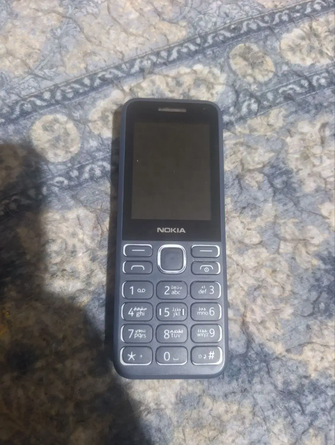 گوشی نوکیا ۱۳۰|موبایل|صحنه, |دیوار