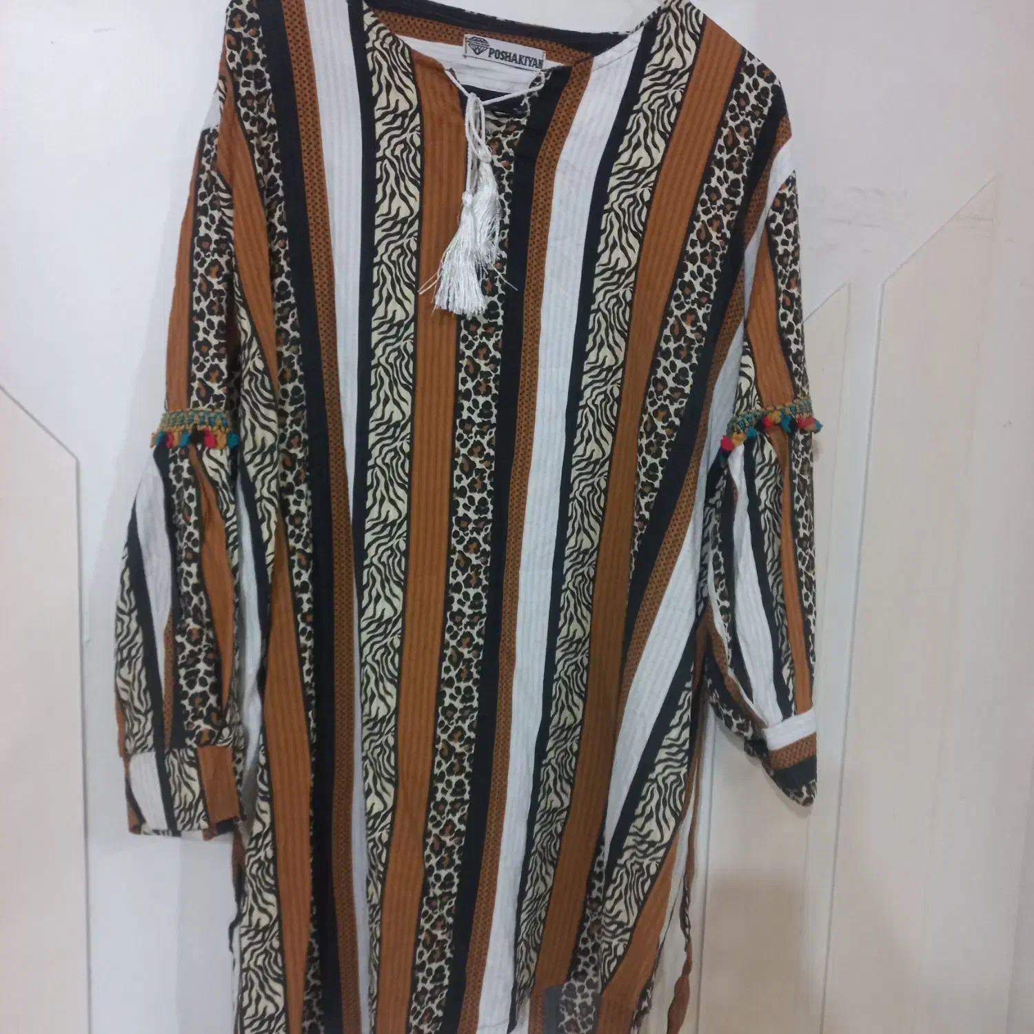 شومیز|لباس|مشهد, فتح المبین|دیوار