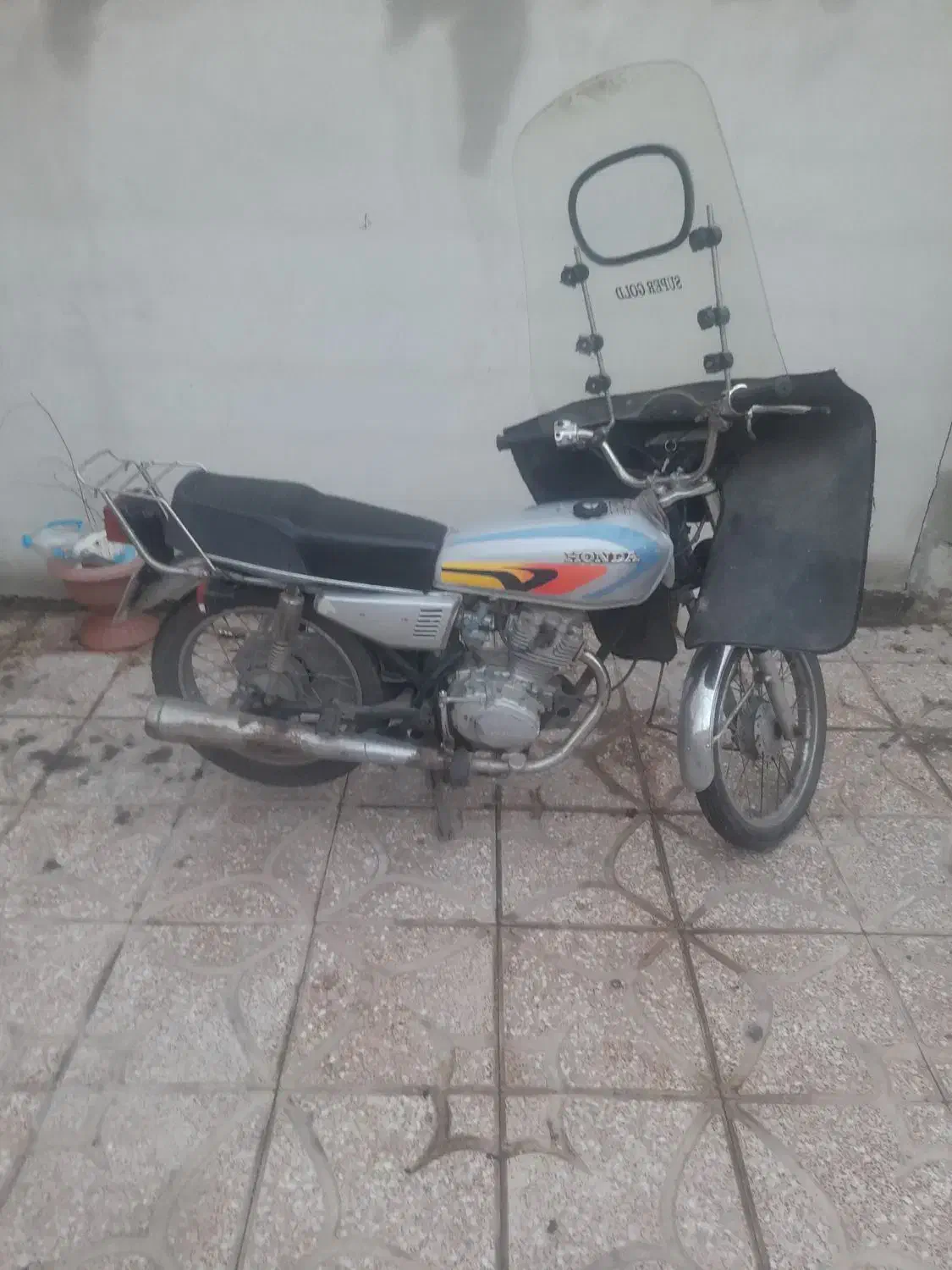 هندا ۱۲۵|موتورسیکلت|میانه, |دیوار