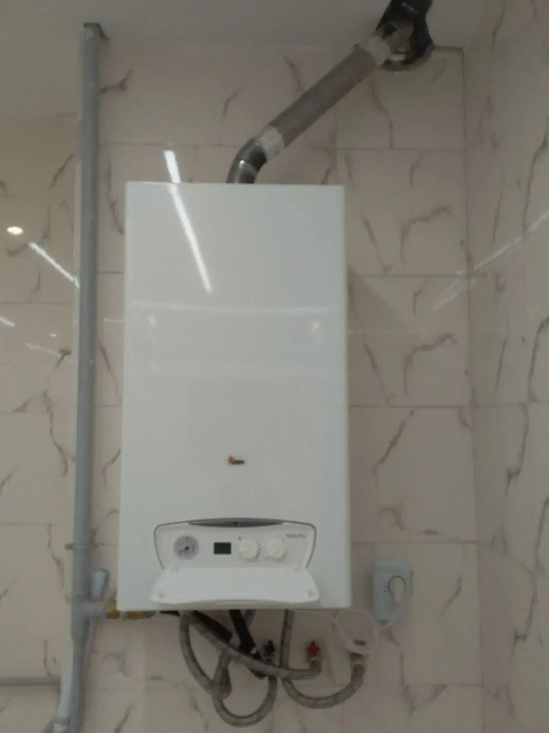 تعمیرونصب انواع پکیج رادیاتور|خدمات پیشه و مهارت|زنجان, |دیوار