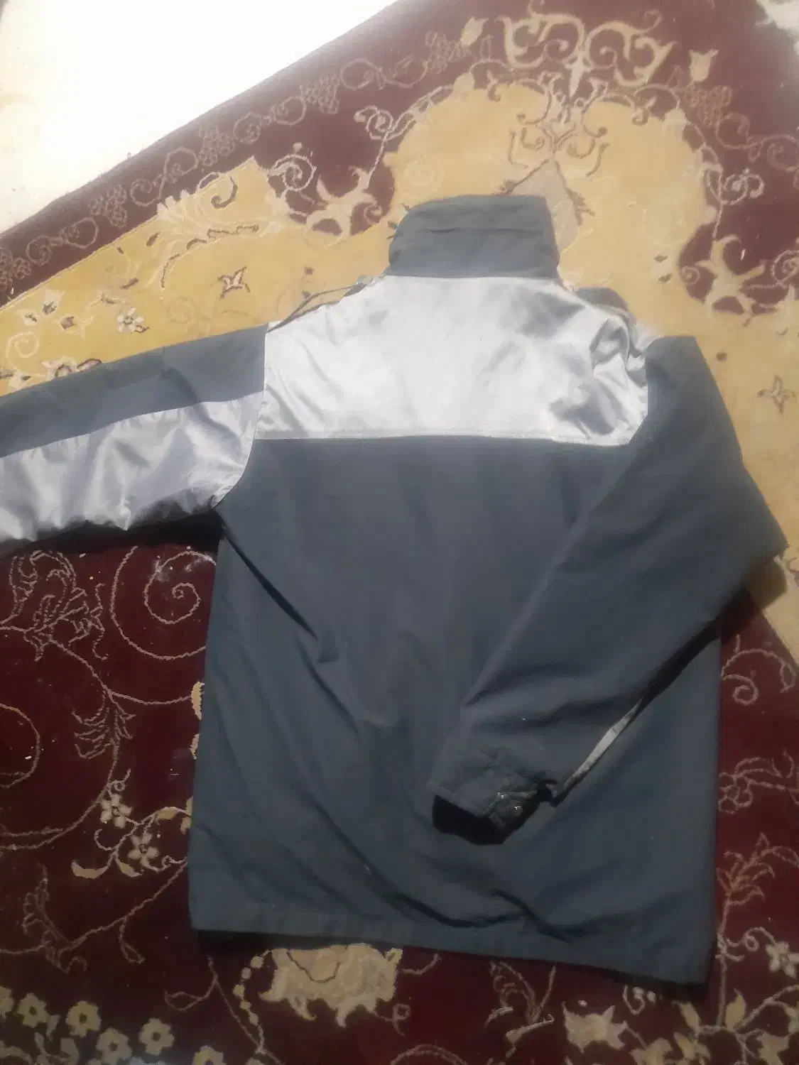 کاپشن نگهبانی اصلی|لباس|گلبهار, شهر جدید گلبهار|دیوار