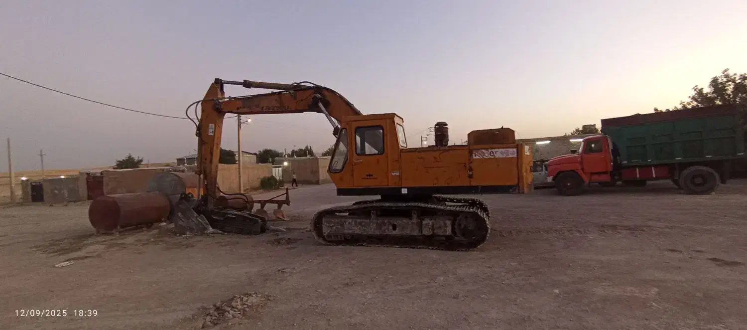 بیل و لودر|خودرو سنگین|کبودرآهنگ, |دیوار