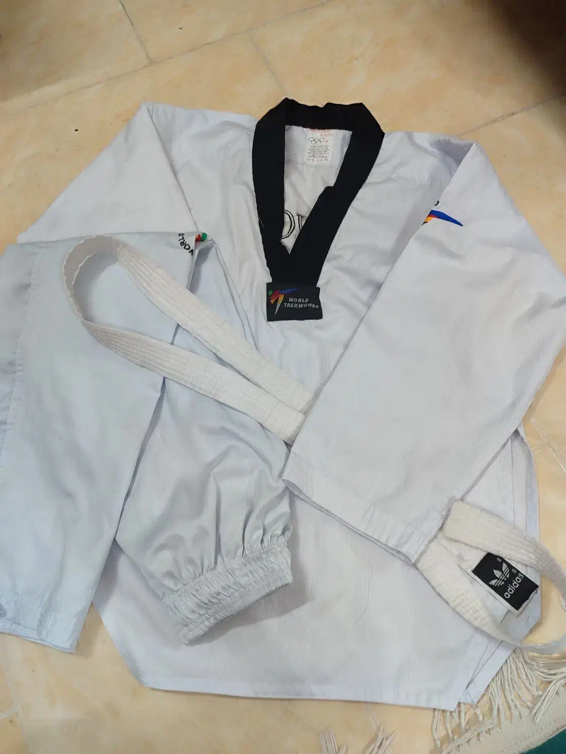 لباس تکواندو|لباس|شیروان (خراسان), |دیوار