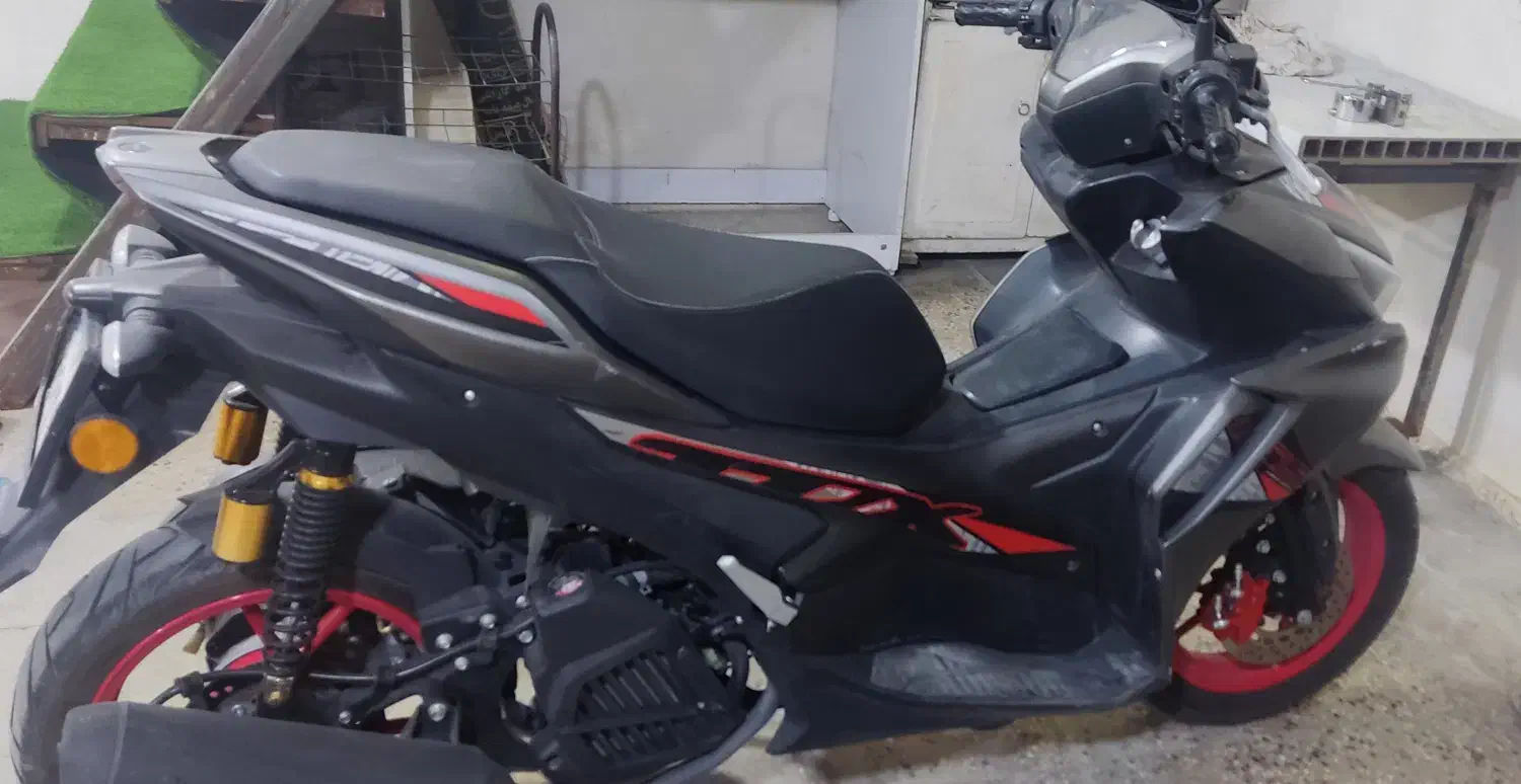 موتور ایروکس توسن .آب خنک|موتورسیکلت|آفتاب, |دیوار