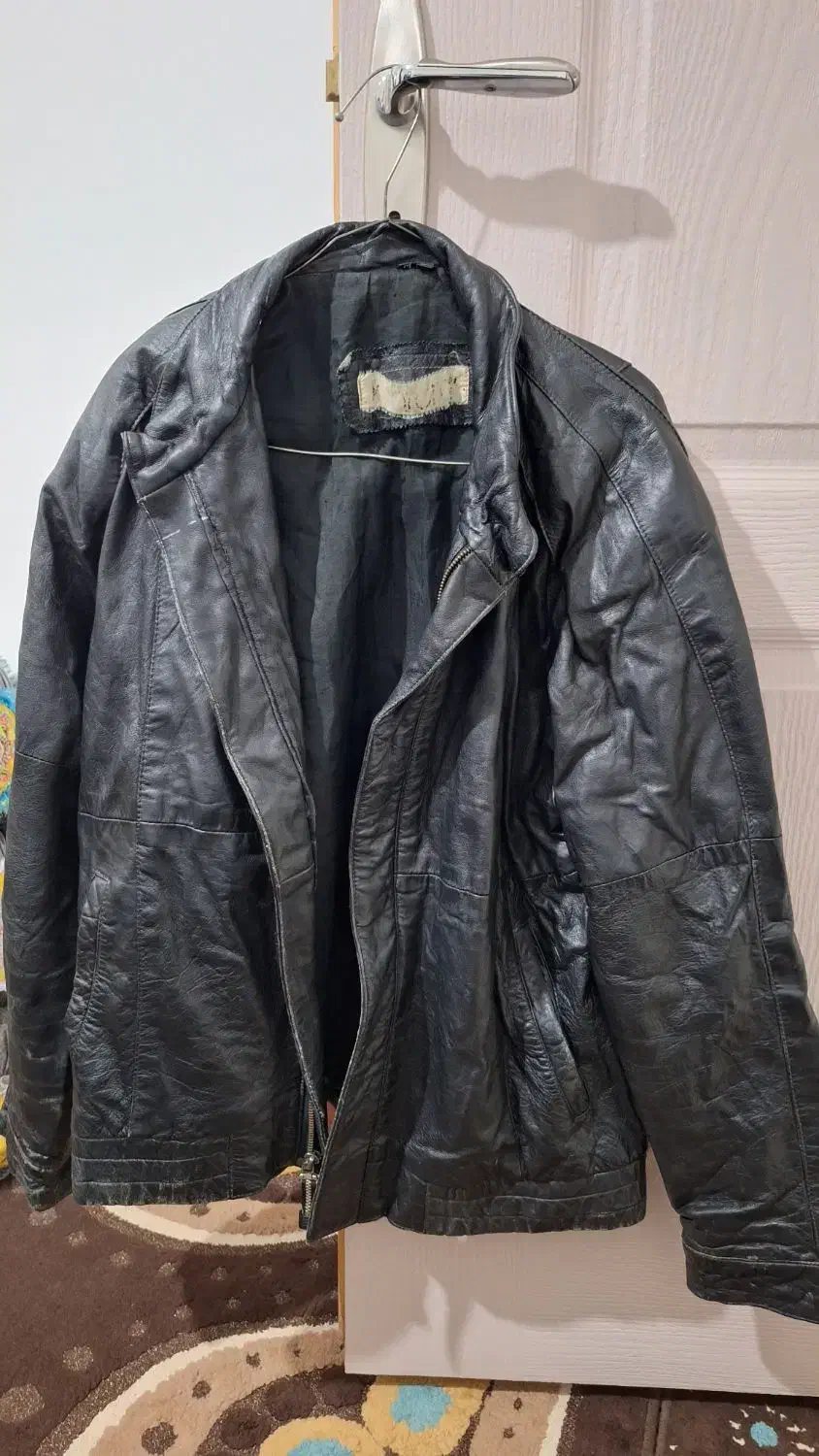 کاپشن|لباس|مسجد سلیمان, |دیوار