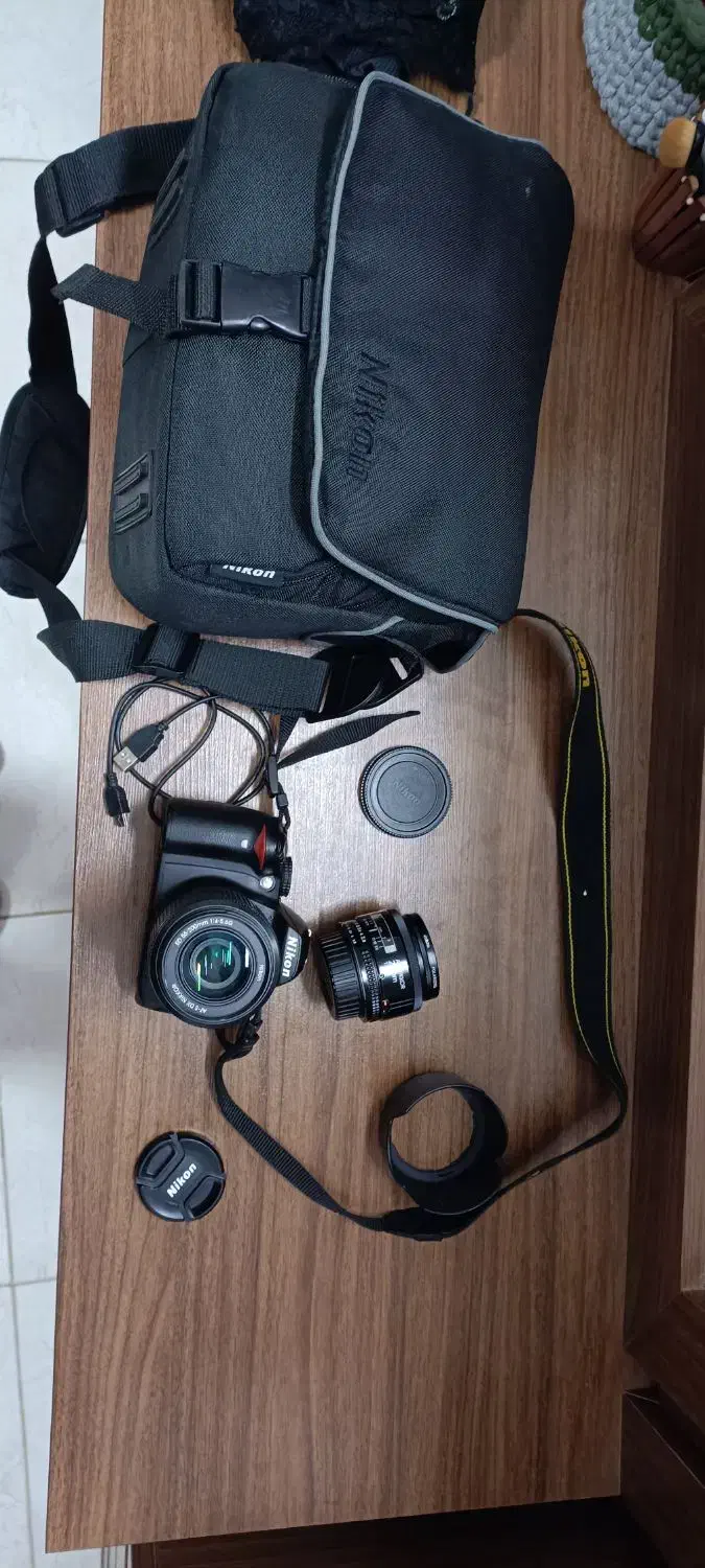 دوربین Nikon D3000 + لنز AF Nikkor 28mm f/2.8|دوربین عکاسی و فیلمبرداری|رشت, سعدی (تختی)|دیوار