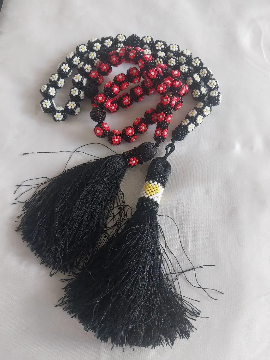 تسبیح زندان بافت طرح گل بابونه|جواهرات|جوانرود, |دیوار