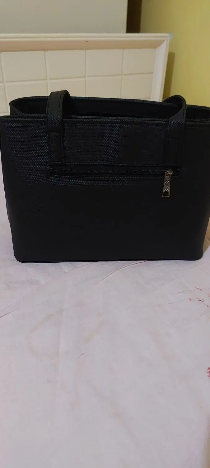 کیف|کیف، کفش، کمربند|کرمان, |دیوار