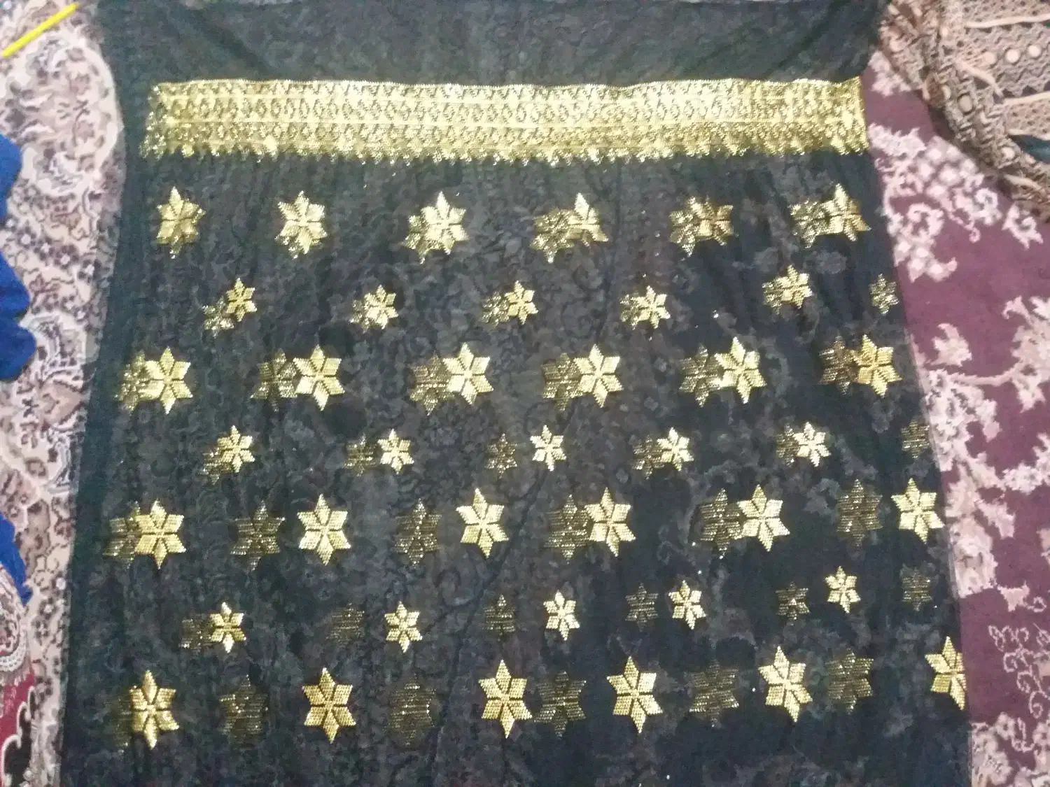 جلویل خوسی|لباس|میناب, |دیوار