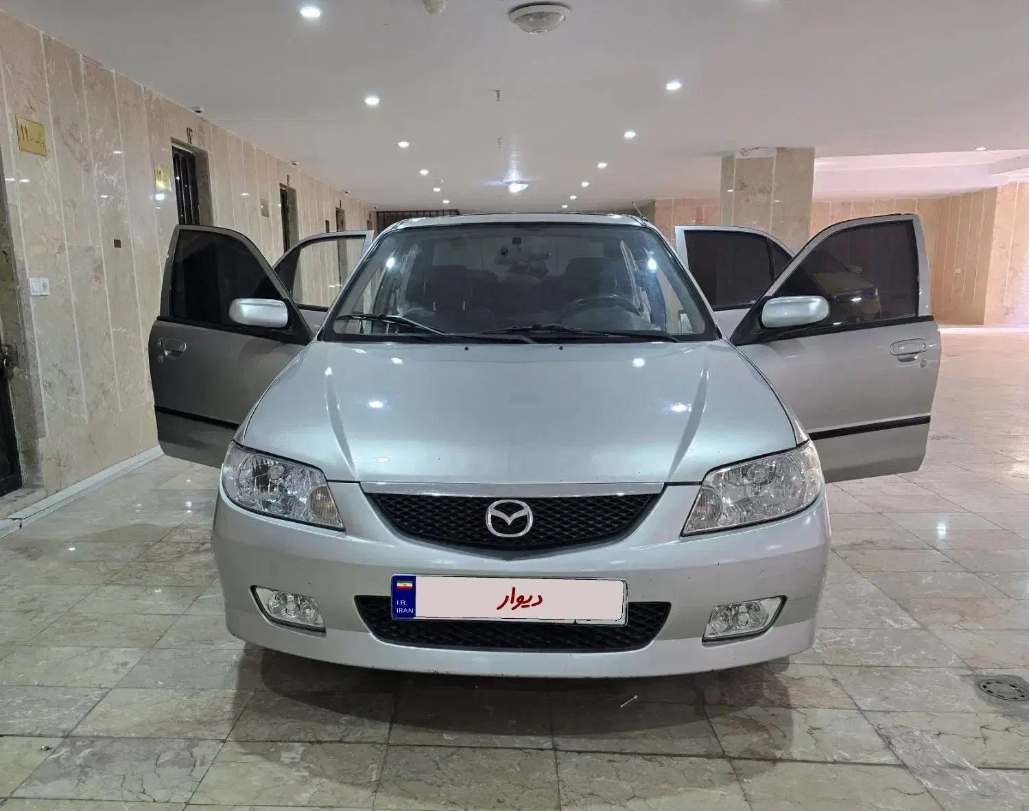 مزدا 323 اتوماتیک FL|خودرو سواری و وانت|پرند, فاز ۰|دیوار