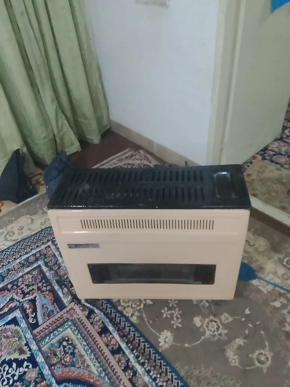 یک عدد بخاری|بخاری، هیتر، شومینه|تربتحیدریه, منظر|دیوار