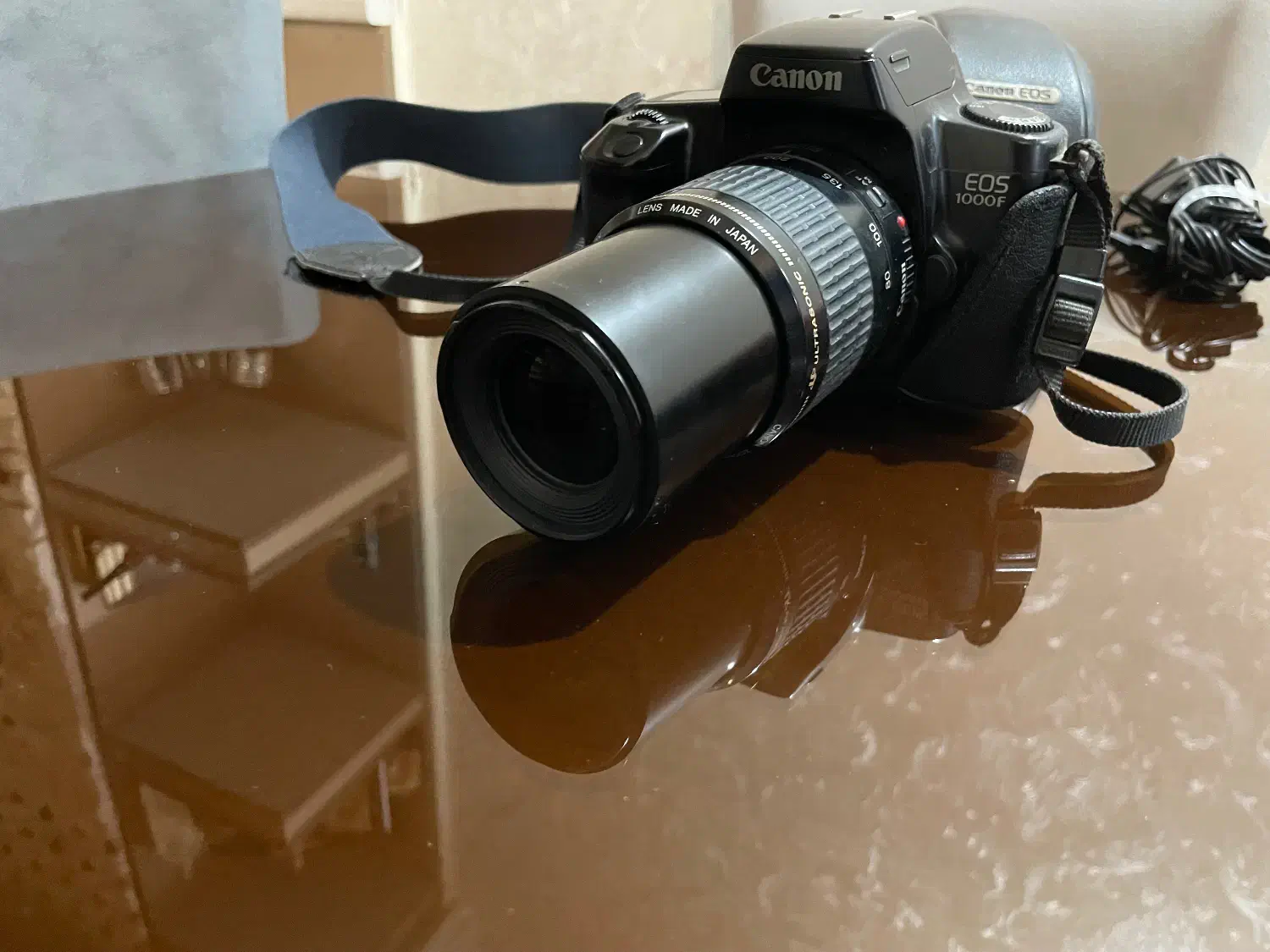 دوربین عکاسی کنون ۱۰۰۰f به همراه فلاش و کیف|دوربین عکاسی و فیلم‌برداری|تهران, مهران|دیوار