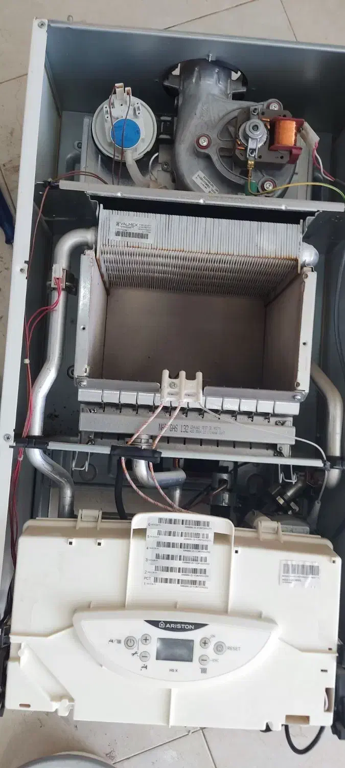 تعمیرات تضمینی انواع پکیج آبگرمکن و گاز صفحه ای|خدمات پیشه و مهارت|یزد, |دیوار