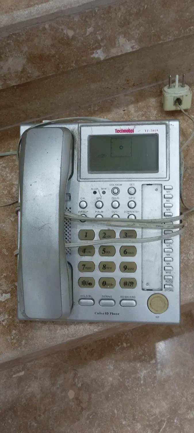 تلفن|تلفن رومیزی|تربتحیدریه, اندیشه|دیوار