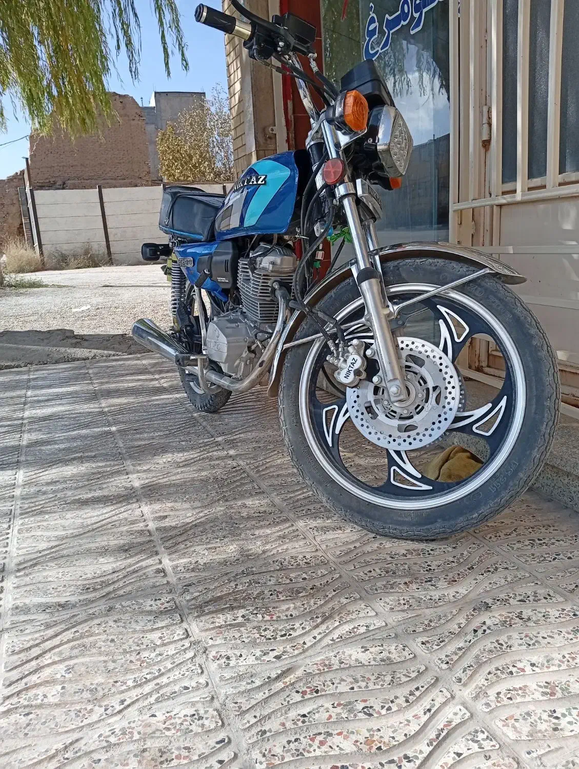 نیکتاز|موتورسیکلت|بروجن, |دیوار