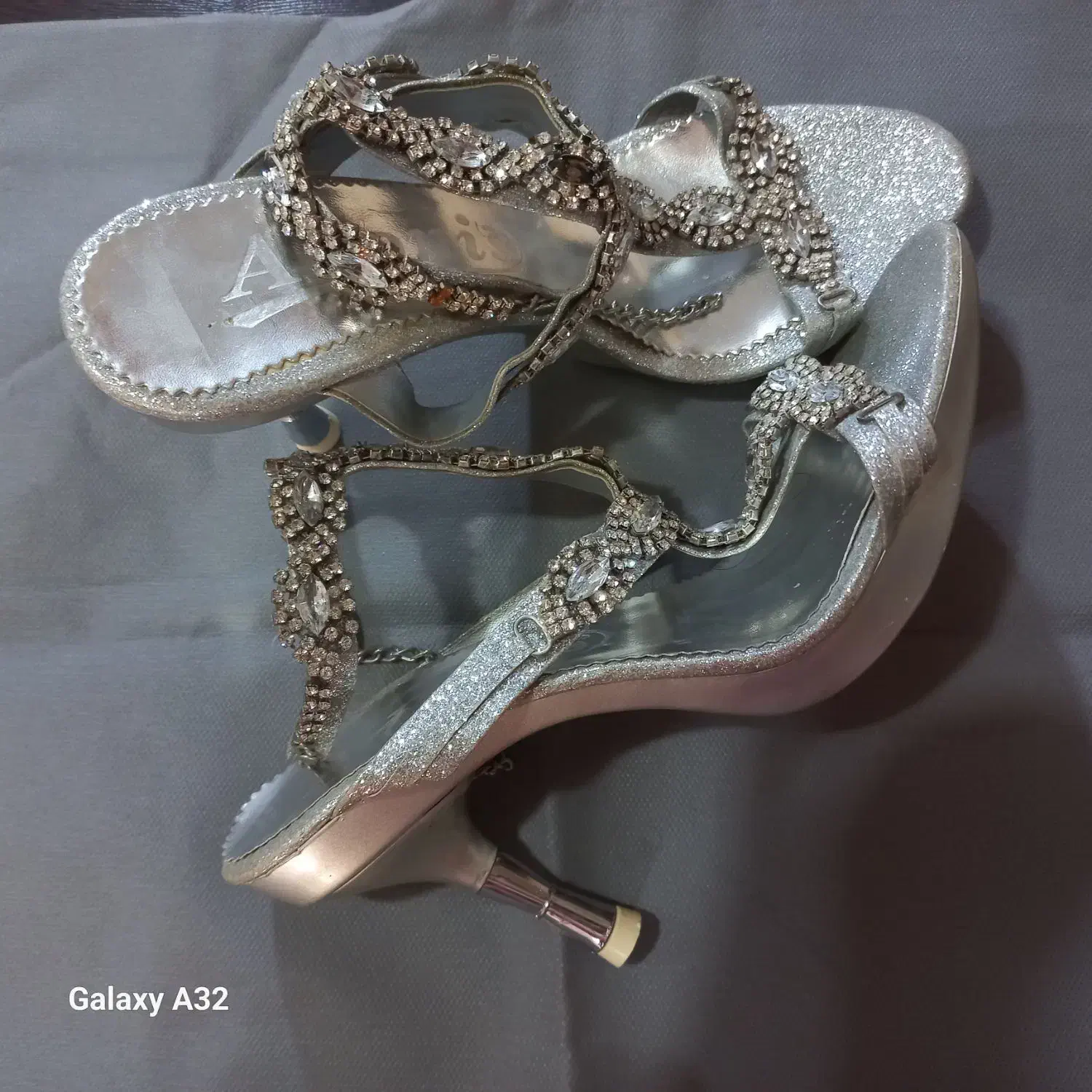 کفش مجلسی|کیف، کفش، کمربند|اصفهان, رکن الدوله شرقی|دیوار