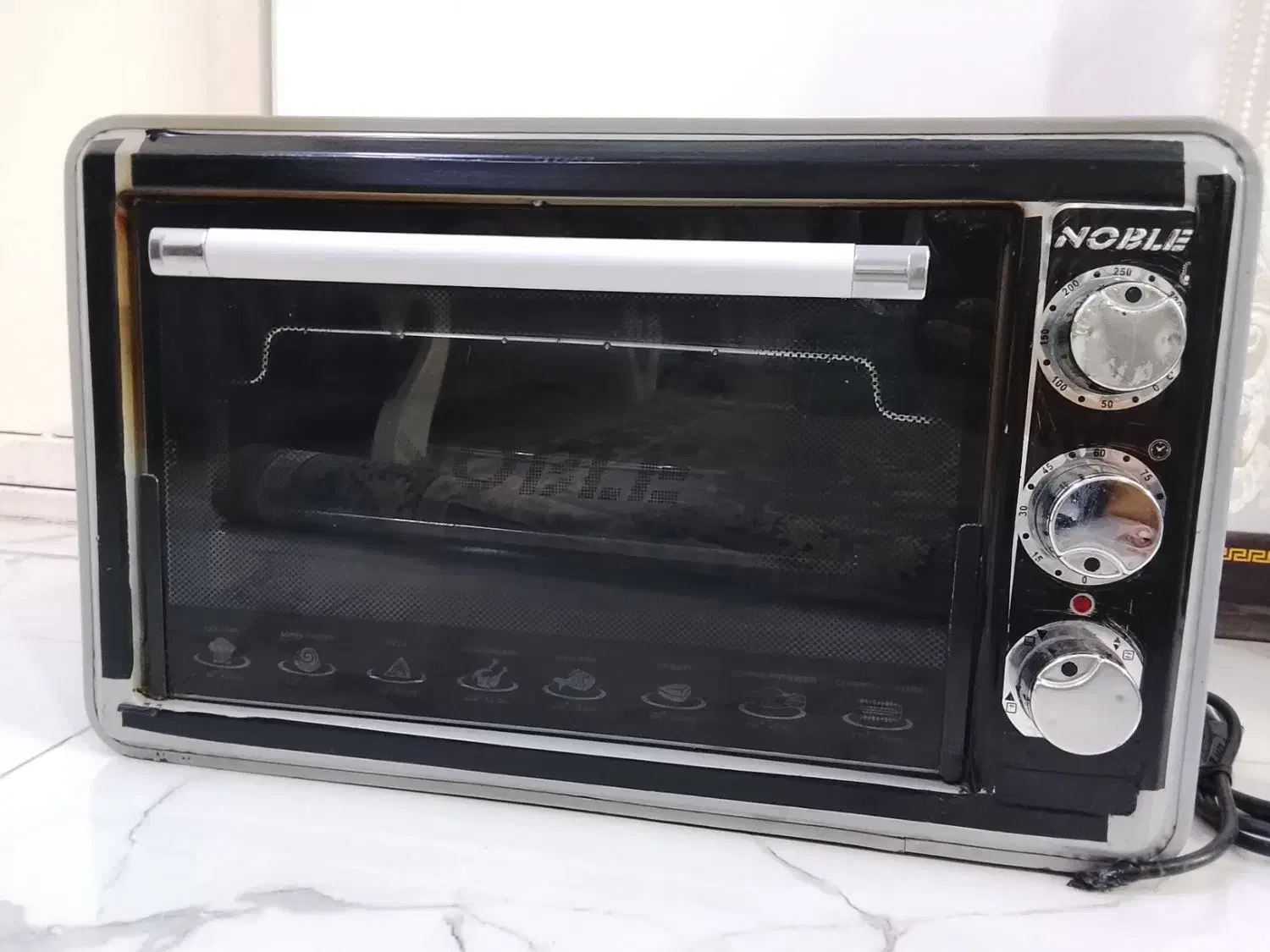 توستر نوبل|اجاق گاز و لوازم برقی پخت‌وپز|قم, تعویض پلاک|دیوار