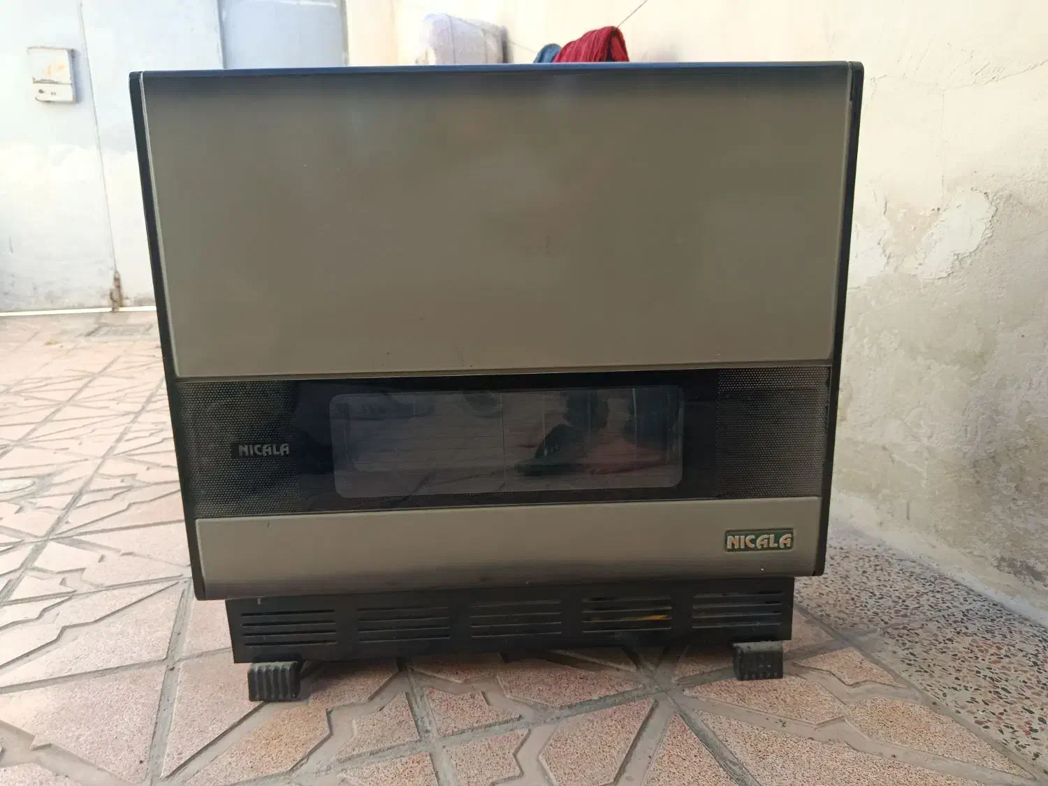 بخاری نیک کالا|بخاری، هیتر، شومینه|اردبیل, |دیوار