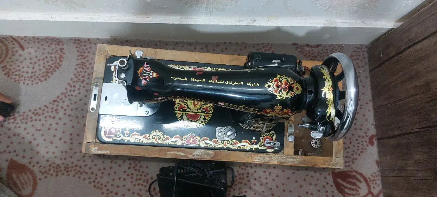 چرخ خیاطی|چرخ خیاطی و ریسندگی|قدس, شهر‌قدس|دیوار