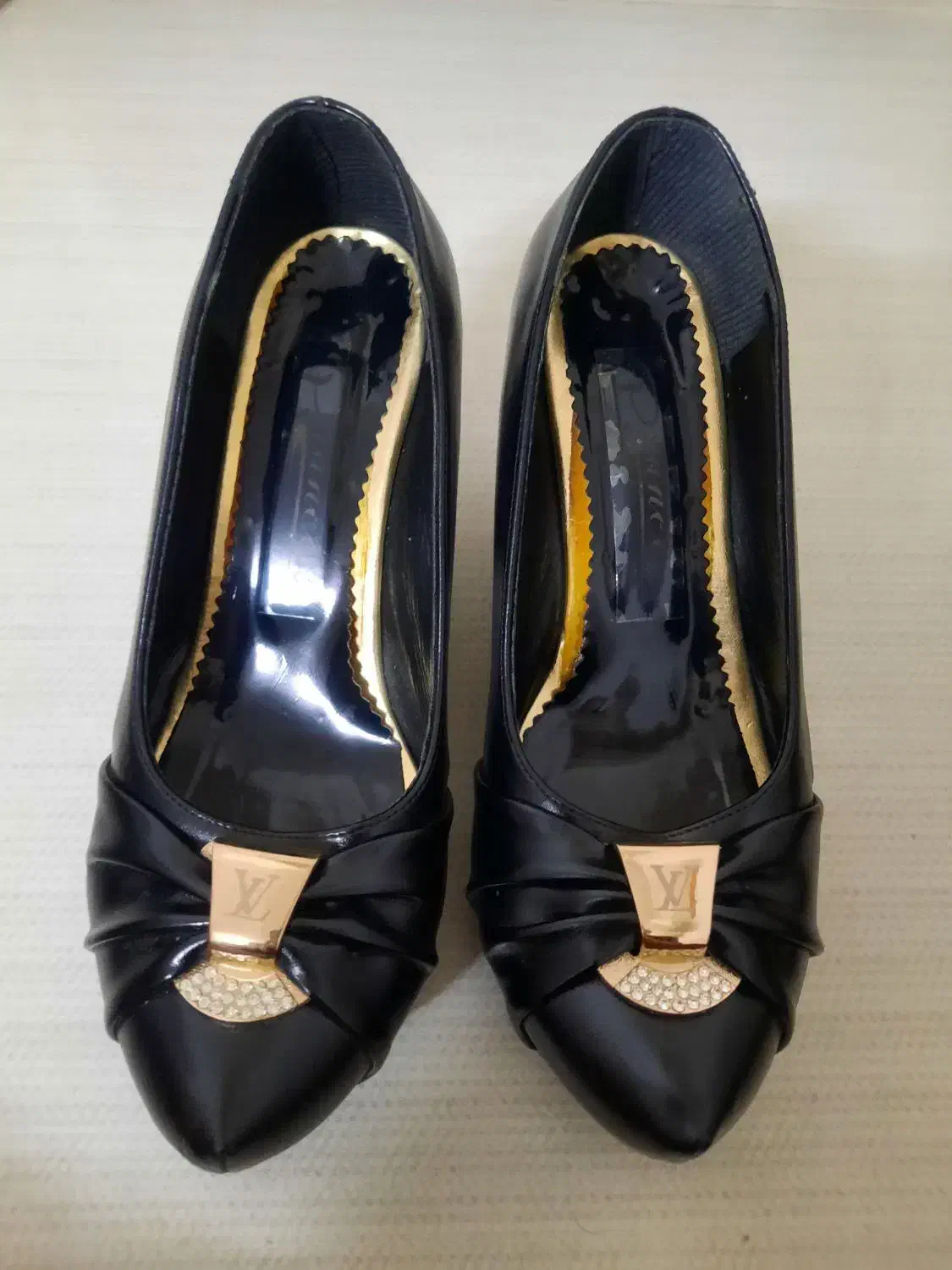 کفش مجلسی|کیف، کفش، کمربند|شیروان (خراسان), |دیوار