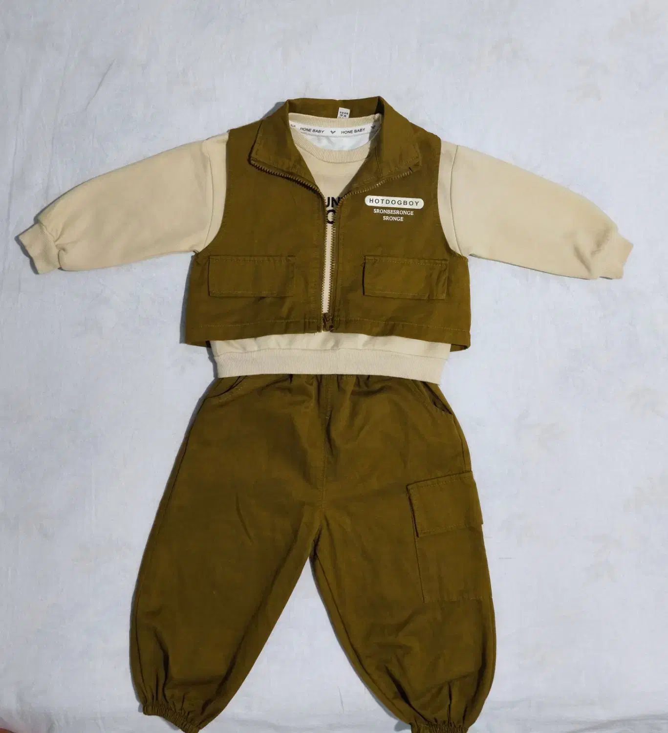 لباس مجلسی پسرانه|کفش و لباس بچه|رباط‌کریم, رباط‌کریم|دیوار