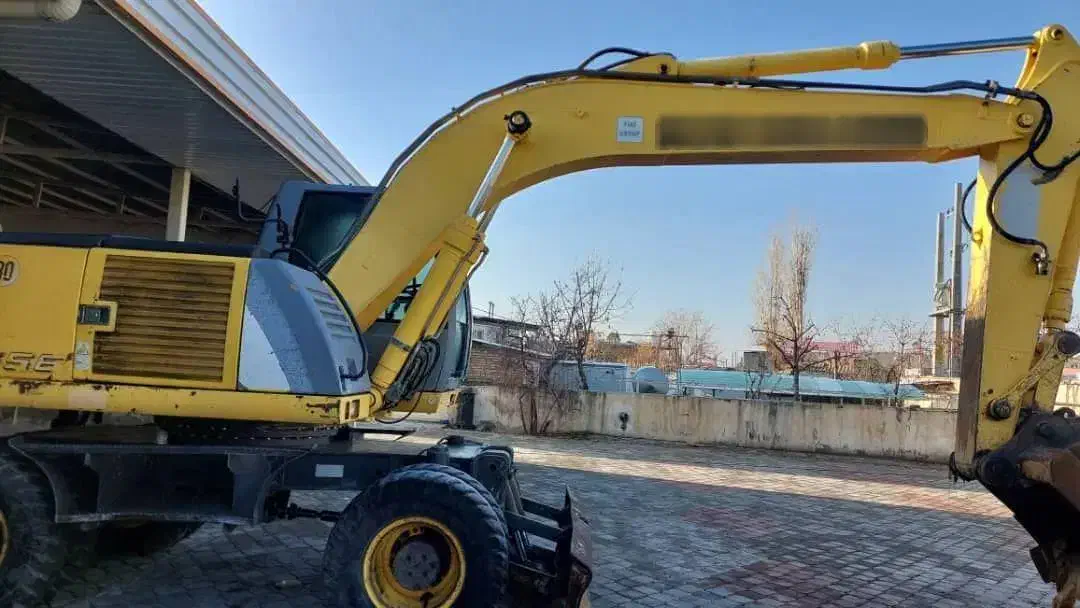 بیل مکانیکی لاستیکی نیوهلند MH|خودرو سنگین|شبستر, |دیوار